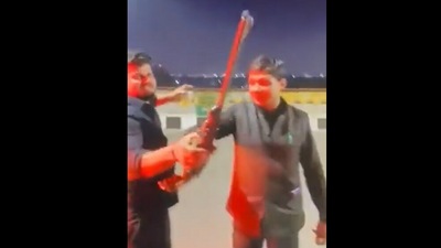 A group of men seen drinking, dancing and brandishing guns on a Ghaziabad road. (Twitter) A group of men seen drinking, dancing and brandishing guns on a Ghaziabad road. (Twitter)