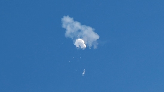 The suspected Chinese spy balloon drifts to the ocean after being shot down off the coast in Surfside Beach, South Carolina, U.S. Saturday.(REUTERS)
