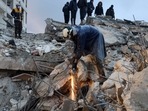 Members of the Syrian civil defence, known as the White Helmets look for casualties under the rubble following an earthquake in the town of Zardana in the countryside of the northwestern Syrian Idlib province, early on February 6, 2023. (AFP) Members of the Syrian civil defence, known as the White Helmets look for casualties under the rubble following an earthquake in the town of Zardana in the countryside of the northwestern Syrian Idlib province, early on February 6, 2023. (AFP)