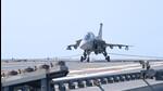 A prototype of the naval version of the locally made light combat aircraft (LCA) on Monday for the first time landed and took off from indigenous aircraft carrier INS Vikrant (HT Photo) A prototype of the naval version of the locally made light combat aircraft (LCA) on Monday for the first time landed and took off from indigenous aircraft carrier INS Vikrant (HT Photo)