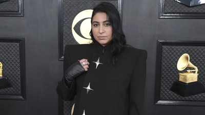 Pakistani singer, composer Arooj Aftab arrived at the 65th annual Grammy Awards in a sleek black blazer decked with star embellishments, stylish skinny-fit pants, high-heeled boots, faux-leather gloves and side-parted sleek hairdo. (Jordan Strauss/Invision/AP) Pakistani singer, composer Arooj Aftab arrived at the 65th annual Grammy Awards in a sleek black blazer decked with star embellishments, stylish skinny-fit pants, high-heeled boots, faux-leather gloves and side-parted sleek hairdo. (Jordan Strauss/Invision/AP)