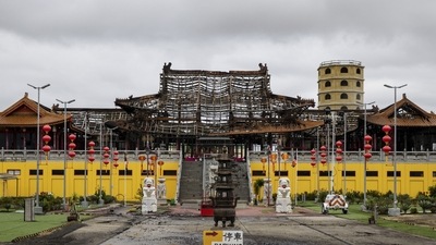 Australia: The damaged structure is seen at the scene of a fire at the Bright Moon Buddhist Temple in Springvale South, Melbourne. (AP)