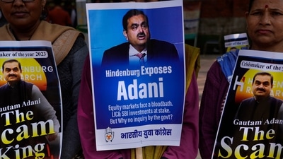 Members of Congress party demand an investigation into allegations of fraud by Adani Group at a protest in New Delhi on Monday (AP) Members of Congress party demand an investigation into allegations of fraud by Adani Group at a protest in New Delhi on Monday (AP)