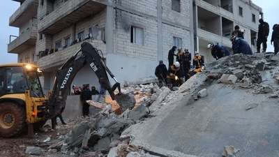 Turkey Earthquake: Members of the Syrian civil defence, known as the White Helmets look for casualties under the rubble following an earthquake, (AFP)