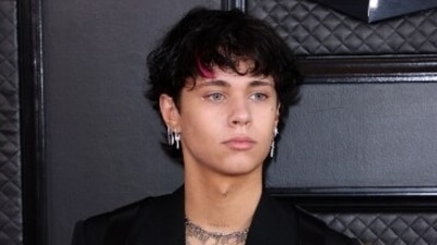 Landon Barker merged the best of both worlds in a nude top with silver sequins, and added a black blazer featuring cut-out details. In black formal trousers, Landon completed the look. (Reuters) Landon Barker merged the best of both worlds in a nude top with silver sequins, and added a black blazer featuring cut-out details. In black formal trousers, Landon completed the look. (Reuters)