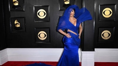Cardi B's blue sculptural couture stole the show and for all the right reasons. The hiphop star posed in the cut-out blue gown and looked every bit gorgeous. (AFP) Cardi B's blue sculptural couture stole the show and for all the right reasons. The hiphop star posed in the cut-out blue gown and looked every bit gorgeous. (AFP)