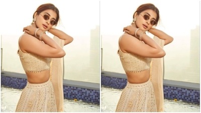 Pooja played muse to fashion designer Sawan Gandhi and picked an ivory white lehenga for brother’s haldi ceremony.&nbsp; (Instagram/@hegdepooja)