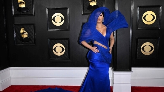 Cardi B's blue sculptural couture stole the show and for all the right reasons. The hiphop star posed in the cut-out blue gown and looked every bit gorgeous.&nbsp;(AFP)