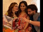 Nita Ambani holding Vogue India magazine as she looks at Isha Ambani. Orry shares the frame with Ambani ladies. (Instagram/@Orry) Nita Ambani holding Vogue India magazine as she looks at Isha Ambani. Orry shares the frame with Ambani ladies. (Instagram/@Orry)