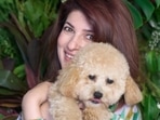 Twinkle Khanna took to Instagram on Thursday to give a glimpse of her dog – Mr Jeeves. The actor-turned-author held the furry pet in her arms in the cute pictures.