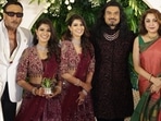 Varalaxmi Sarathkumar and Nicholai Sachdev posed with their guests. Varalaxmi Sarathkumar and Nicholai Sachdev posed with their guests.