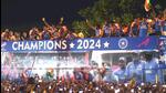 Players of the T20 World Cup-winning team acknowledge fans during their open bus victory parade, in Mumbai, on Thursday. (PTI) Players of the T20 World Cup-winning team acknowledge fans during their open bus victory parade, in Mumbai, on Thursday. (PTI)