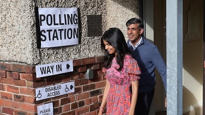 Britain's Prime Minister Rishi Sunak and his wife Akshata Murty leave a polling station after voting near Richmond, North Yorkshire, England, Thursday, July 4, 2024. (AP) Britain's Prime Minister Rishi Sunak and his wife Akshata Murty leave a polling station after voting near Richmond, North Yorkshire, England, Thursday, July 4, 2024. (AP)