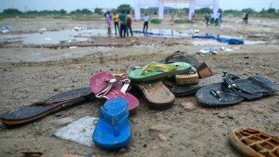 Shoes are pictured where a stampede killed people during a sermon at Hathras in Uttar Pradesh on July 3, 2024. (AFP) Shoes are pictured where a stampede killed people during a sermon at Hathras in Uttar Pradesh on July 3, 2024. (AFP)