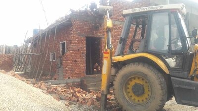 MC razes an illegal constructions in Lohara area of Ludhiana on Thursday. (HT Photo)