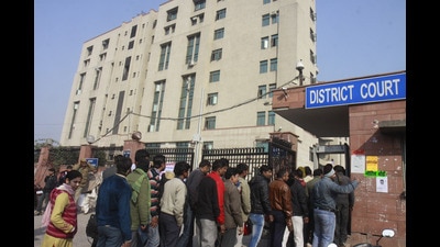 New Delhi, India_ 07 January 2013 : Long queues of persons seen at the gate of Saket court at the Saket District court, in New Delhi, India, Monday, January 7, 2013. ( Photo By Sonu Mehta/ Hindustan Times) (Hindustan Times)