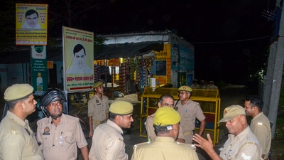 Police personnel stand guard at Ram Kutir Charitable Trust, the ashram of preacher Baba Narayan Hari, also known as Saakar Vishwa Hari Bhole Baba, at Bichhwa, in Mainpuri district, Wednesday, July 3, 2024. (PTI) Police personnel stand guard at Ram Kutir Charitable Trust, the ashram of preacher Baba Narayan Hari, also known as Saakar Vishwa Hari Bhole Baba, at Bichhwa, in Mainpuri district, Wednesday, July 3, 2024. (PTI)