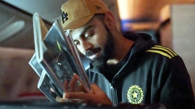 : Indian cricketer Virat Kohli aboard a charter flight to New Delhi. Indian cricket team on Thursday returned home after winning the ICC Men's T20 World Cup 2024 in Barbados. (PTI Photo) (PTI) : Indian cricketer Virat Kohli aboard a charter flight to New Delhi. Indian cricket team on Thursday returned home after winning the ICC Men's T20 World Cup 2024 in Barbados. (PTI Photo) (PTI)
