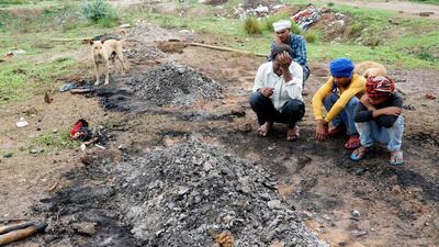 Relatives perform the last rites of a deceased in Hathras. (PTI) Relatives perform the last rites of a deceased in Hathras. (PTI)