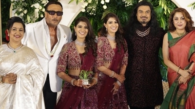 Varalaxmi Sarathkumar and Nicholai Sachdev posed with their guests.