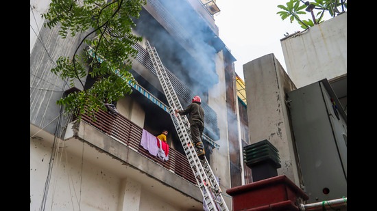A firefighter at the site of the incident. (PTI) A firefighter at the site of the incident. (PTI)