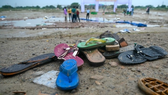 Shoes are pictured where a stampede killed people during a sermon at Hathras in Uttar Pradesh on July 3, 2024. 