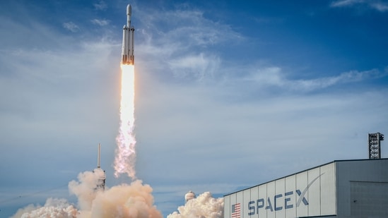 TOPSHOT - A SpaceX Falcon Heavy rocket carrying the National Oceanic and Atmospheric Administration's (NOAA) weather satellite Geostationary Operational Environmental Satellite U (GOES-U) lifts off from Launch Complex 39A at NASA's Kennedy Space Center, Florida, June 25, 2024. 