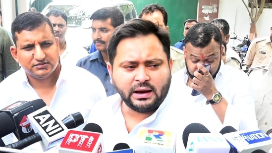 RJD leader Tejashwi Yadav speaking with media persons outside of his residence 
in Patna, Bihar. (Photo by Santosh Kumar/ Hindustan Times)