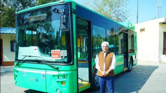 The department expects to operate 2,180 such buses by 2025. The buses and the electrification process were inspected at the Dwarka depot by the transport minister on Tuesday. (HT Photo)