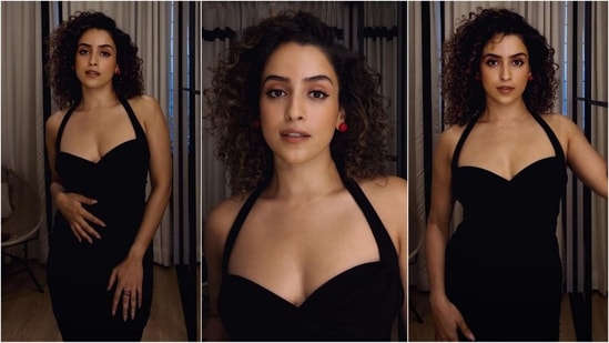 Sanya Malhotra hit the fashion targets in a stunning black bodycon dress with a sweetheart halter neckline and a figure-hugging fit that accentuated her gorgeous curves. Paired with red stud earrings and her naturally curly hair, she looked super stylish.(Instagram/@sanyamalhotra_ )