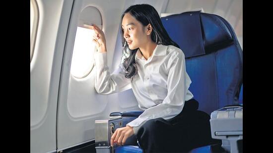 Travellers are choosing to pass the time on flights without entertainment of any kind. (ADOBE STOCK)