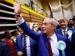 Britain's Reform UK Party Leader Nigel Farage gestures as he walks after winning his first seat in parliament during the UK election in Clacton-on-Sea, Britain, July 5, 2024. REUTERS/Clodagh Kilcoyne