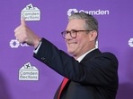 Britain's Labour Party leader Keir Starmer gives a thumbs up to his supporters after he was elected for the Holborn and St Pancras constituency, in London, Friday, July 5, 2024. Britain's Labour Party leader Keir Starmer gives a thumbs up to his supporters after he was elected for the Holborn and St Pancras constituency, in London, Friday, July 5, 2024.