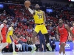 (FILES) LeBron James #23 of the Los Angeles Lakers shoots as Zion Williamson #1 of the New Orleans Pelicans defends during the second half of a play-in tournament game at the Smoothie King Center on April 16, 2024 in New Orleans, Louisiana.