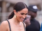 Meghan Markle seeks luxurious remote island retreat for family vacation. (AP Photo/Sunday Alamba)