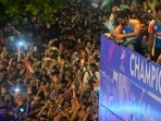 Rohit Sharma with the T20 World Cup trophy on the open-top bus during the parade Rohit Sharma with the T20 World Cup trophy on the open-top bus during the parade
