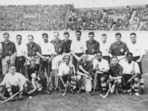 Dhyan Chand (front left) and the rest of the Indian men's hockey team that won the country's first Olympic gold at the 1928 Olympics. (Getty Images)