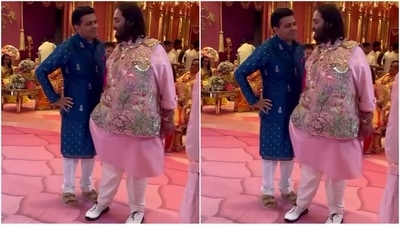 Anant Ambani chose a pastel pink kurta, pairing it with a trendy waistcoat adorned with intricate floral embellishments. He completed the look with white pajamas and quirky shoes, giving off a super trendy vibe. (Instagram) Anant Ambani chose a pastel pink kurta, pairing it with a trendy waistcoat adorned with intricate floral embellishments. He completed the look with white pajamas and quirky shoes, giving off a super trendy vibe. (Instagram)