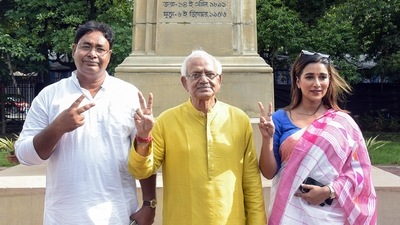 Kolkata, Jul 05 (ANI): TMC leaders Sayantika Banerjee (extreme right) and Reyat Hossain Sarkar (extreme left) with West Bengal Parliamentary Affairs Minister Sobhandeb Chattopadhyay show victory sign after taking oath as MLA, at the State Legislative Assembly in Kolkata on Friday. Kolkata, Jul 05 (ANI): TMC leaders Sayantika Banerjee (extreme right) and Reyat Hossain Sarkar (extreme left) with West Bengal Parliamentary Affairs Minister Sobhandeb Chattopadhyay show victory sign after taking oath as MLA, at the State Legislative Assembly in Kolkata on Friday.