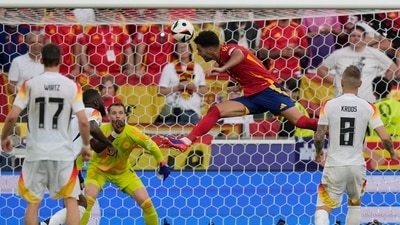 Spain's Mikel Merino, centre, scores his side's second goal during a quarter final match between Germany and Spain at the Euro 2024 soccer tournament in Stuttgart, Germany, Friday, July 5, 2024. (AP) Spain's Mikel Merino, centre, scores his side's second goal during a quarter final match between Germany and Spain at the Euro 2024 soccer tournament in Stuttgart, Germany, Friday, July 5, 2024. (AP)