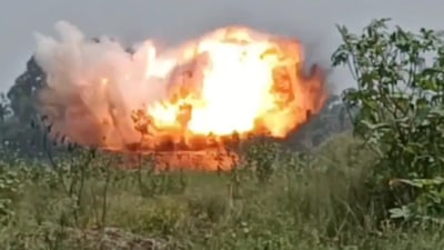 Air Force officials on Friday disposed of a World War2-era bomb through controlled explosion in Bengal’s Jhargram district (Video screengrab) Air Force officials on Friday disposed of a World War2-era bomb through controlled explosion in Bengal’s Jhargram district (Video screengrab)