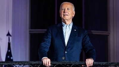 US President Joe Biden arrives to view the Independence Day fireworks display over the National Mall from the Truman Balcony of the White House in Washington, DC, US, on Thursday, July 4, 2024. (Bloomberg) US President Joe Biden arrives to view the Independence Day fireworks display over the National Mall from the Truman Balcony of the White House in Washington, DC, US, on Thursday, July 4, 2024. (Bloomberg)