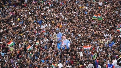 Fans wait for the arrival of Indian cricket team members for a victory parade to celebrate winning the ICC men's T20 World Cup, along the Marine Drive in Mumbai, India (REUTERS)