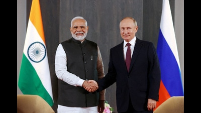 FILE PHOTO: Russian President Vladimir Putin and Indian Prime Minister Narendra Modi attend a meeting on the sidelines of the Shanghai Cooperation Organization (SCO) summit in Samarkand, Uzbekistan September 16, 2022. Sputnik/Alexander Demyanchuk/Pool via REUTERS (via REUTERS)