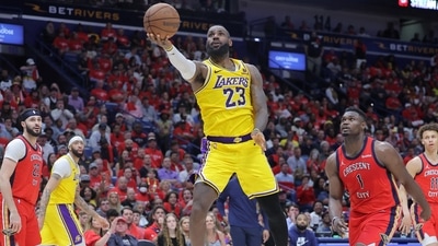 (FILES) LeBron James #23 of the Los Angeles Lakers shoots as Zion Williamson #1 of the New Orleans Pelicans defends during the second half of a play-in tournament game at the Smoothie King Center on April 16, 2024 in New Orleans, Louisiana. (AFP) (FILES) LeBron James #23 of the Los Angeles Lakers shoots as Zion Williamson #1 of the New Orleans Pelicans defends during the second half of a play-in tournament game at the Smoothie King Center on April 16, 2024 in New Orleans, Louisiana. (AFP)
