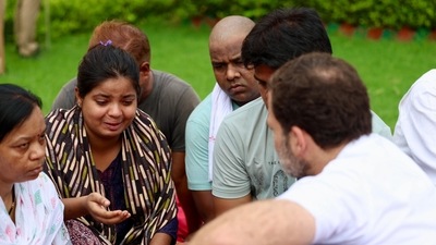 Hathras victims' families talking to Congress MP Rahul Gandhi. Hathras victims' families talking to Congress MP Rahul Gandhi.