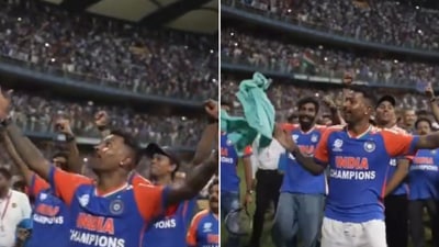 The image shows a fan’s T-shirt in Hardik Pandya’s hand in Wankhede, with Jasprit Bumrah standing just behind him. (Screengrab) The image shows a fan’s T-shirt in Hardik Pandya’s hand in Wankhede, with Jasprit Bumrah standing just behind him. (Screengrab)