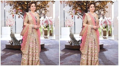 Nita Ambani got decked up in custom made ivory lehenga by Manish Malhota. Her outfit features vintage multi hued traditional zardosi embroidery, woven banarsi tissue dupatta with hand embroidered timeless intricate zari borders and a matching blouse. (Instagram) Nita Ambani got decked up in custom made ivory lehenga by Manish Malhota. Her outfit features vintage multi hued traditional zardosi embroidery, woven banarsi tissue dupatta with hand embroidered timeless intricate zari borders and a matching blouse. (Instagram)