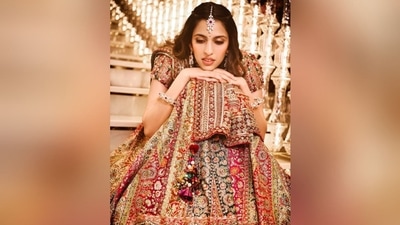 She accessorised her look with opulent diamond jewellery, including a luxurious necklace, maang tikka, statement earrings, and bangles adorning her wrist. (Instagram) She accessorised her look with opulent diamond jewellery, including a luxurious necklace, maang tikka, statement earrings, and bangles adorning her wrist. (Instagram)
