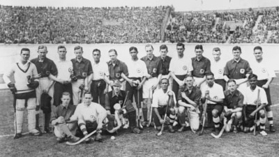 India's first-ever medal was the gold by the men's hockey team at the 1928 Antwerp Olympics. A young Dhyan Chand, who won the first of three gold medals at Antwerp 1928, can be seen in this image, kneeling down first from right. It was the team's maiden appearance at the Olympics and it started a streak of gold medals that would last until the 1956 Olympics, when India lost in the gold medal match to Pakistan. India topped a group that consisted of Belgium, Denmark, Switzerland and Austria. The Netherlands faced them in the final, having topped the other group that consisted of Germany, France and Spain and India won the match 3-0. Hockey was the only sport where India got medals at the Olympics for several years until the 1952 Olympics when wrestler KD Jadhav won bronze and thus became the first individual medallist to represent independent India. After India missed out on gold in 1960 to Pakistan, they won it back in 1964 but then finished with bronze medals in 1968 and 1972. India then won gold in 1980 and then didn't win any Olympic medals at all until 2021. (Getty Images) India's first-ever medal was the gold by the men's hockey team at the 1928 Antwerp Olympics. A young Dhyan Chand, who won the first of three gold medals at Antwerp 1928, can be seen in this image, kneeling down first from right. It was the team's maiden appearance at the Olympics and it started a streak of gold medals that would last until the 1956 Olympics, when India lost in the gold medal match to Pakistan. India topped a group that consisted of Belgium, Denmark, Switzerland and Austria. The Netherlands faced them in the final, having topped the other group that consisted of Germany, France and Spain and India won the match 3-0. Hockey was the only sport where India got medals at the Olympics for several years until the 1952 Olympics when wrestler KD Jadhav won bronze and thus became the first individual medallist to represent independent India. After India missed out on gold in 1960 to Pakistan, they won it back in 1964 but then finished with bronze medals in 1968 and 1972. India then won gold in 1980 and then didn't win any Olympic medals at all until 2021. (Getty Images)